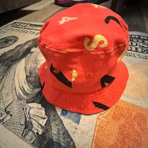 Vibrant Red Bucket Hat with Yellow and Black Details